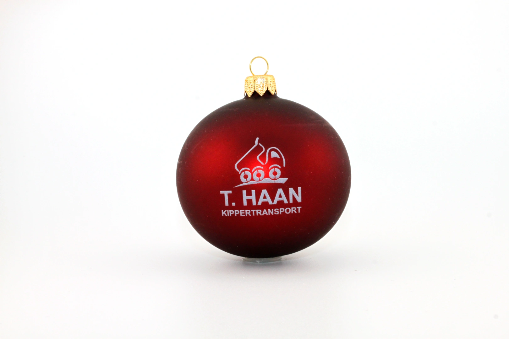 Weihnachtskugel mit logo “ rote Kugel mit weißem THAAN-Schriftzug